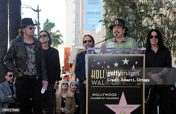 Musician Carlos Santana with Mana at the Mana Star ceremony on The Hollywood Walk of Fame held on February 10, 2016 in Hollywood, California.