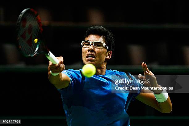 Hyeon Chung of South Korea in action against Viktor Troicki of Serbia during day 4 of the ABN AMRO World Tennis Tournament held at Ahoy Rotterdam on...