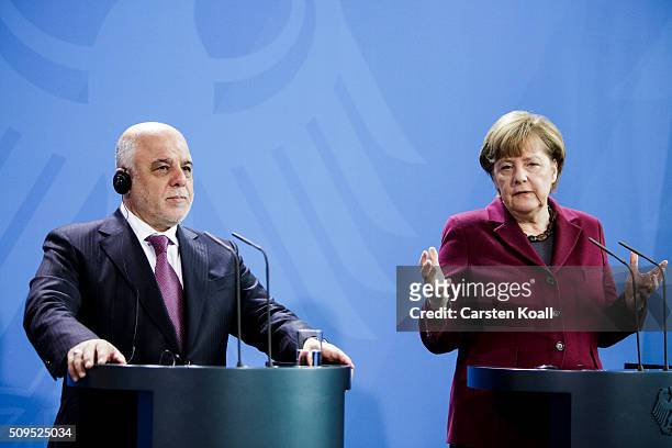 German Chancellor Angela Merkel and Iraqi Prime Minister Haider al-Abadi speak to the media following talks at the Chancellery on February 11, 2016...