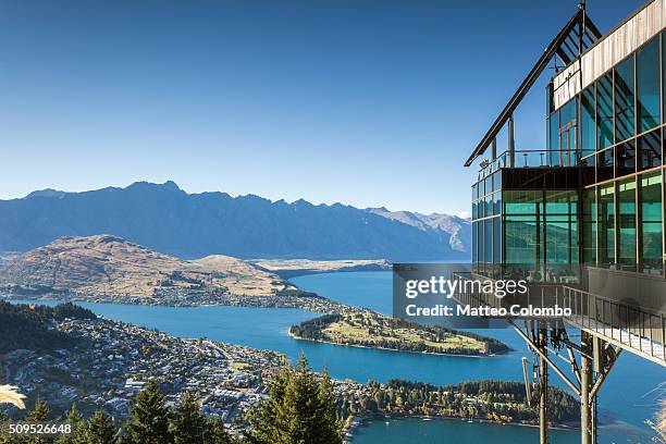 iconic elevated view of queenstown, new zealand - queenstown new zealand stock pictures, royalty-free photos & images