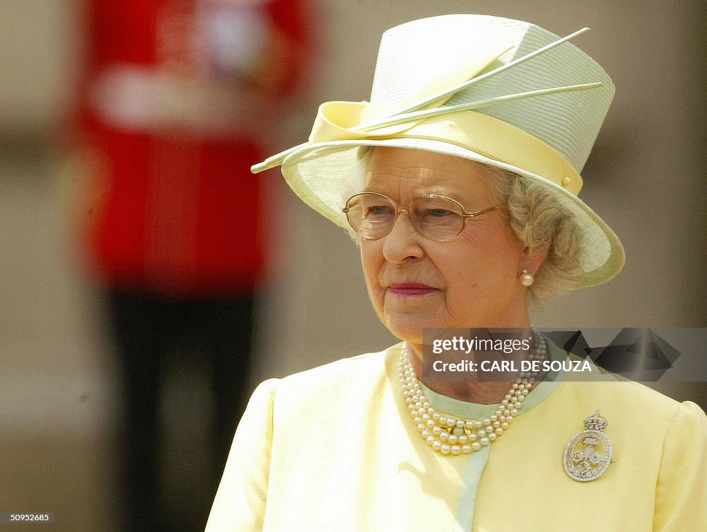 Queen Elizabeth watches the annual Troop