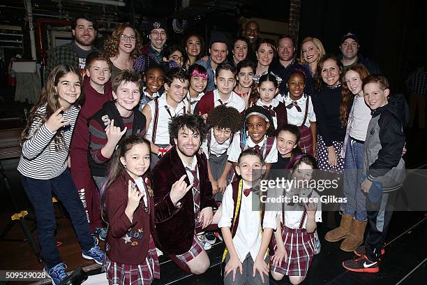 Molly Shannon and kids Nolan & Stella Chesnut pose backstage with the cast at the hit musical "School of Rock" on Broadway at The Winter Garden...