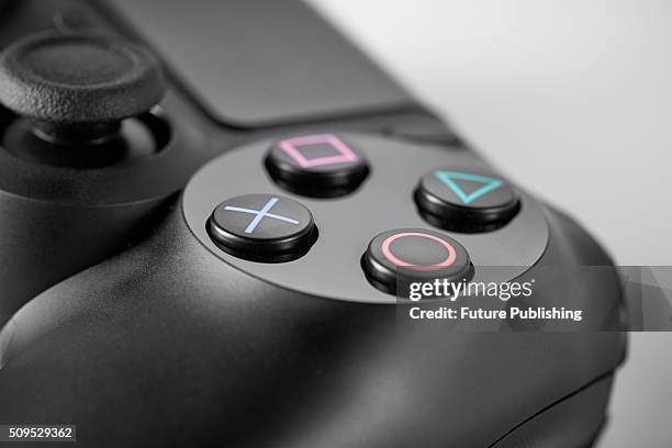 Detail of the buttons on a Sony DualShock 4 wireless controller, taken on January 22, 2016.