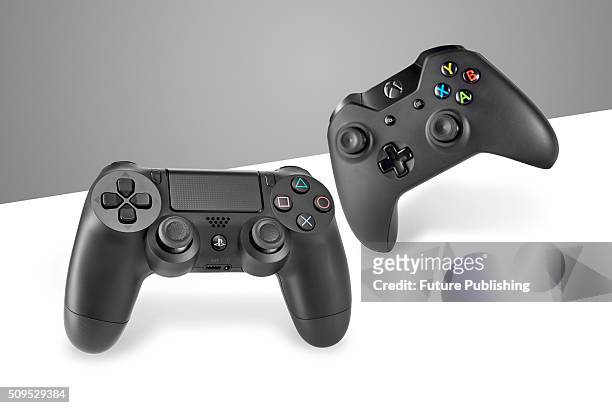 Sony DualShock 4 wireless controller and Microsoft Xbox One wireless controller, taken on January 22, 2016.