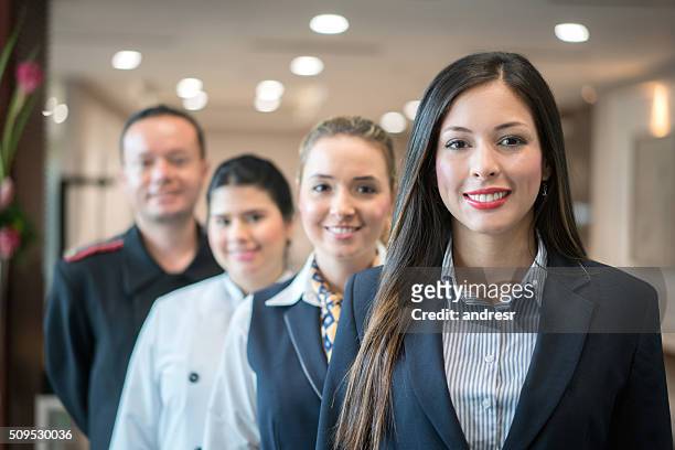group of people working at the hotel - hotel stock pictures, royalty-free photos & images