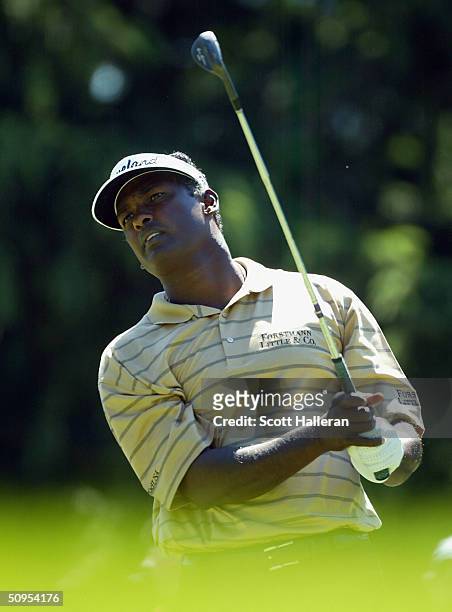 Vijay Singh of Fiji hits his tee shot on the sixth hole during the third round of the Buick Classic on June 12, 2004 at the Westchester Country Club...