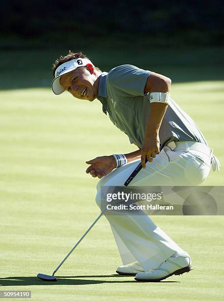 Fredrik Jacobson of Sweden urges a putt to drop on the 11th green during the third round of the Buick Classic on June 12, 2004 at the Westchester...