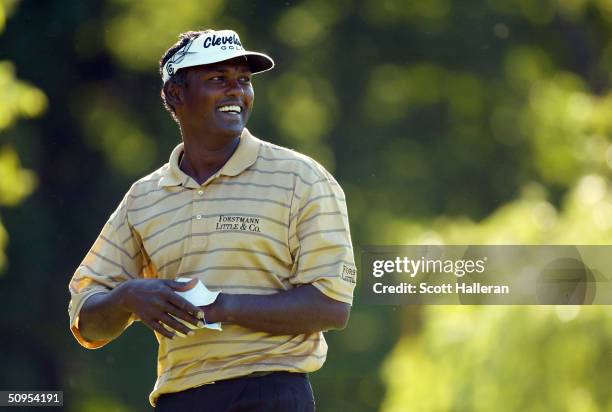 Vijay Singh of Fiji laughs on the 17th tee during the third round of the Buick Classic on June 12, 2004 at the Westchester Country Club in Harrison,...