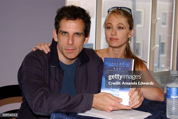 Actors Ben Stiller and Christine Taylor sign copies of "Tales From The Bed" on June 12, 2004 at Borders in Santa Monica, California. The book is the...