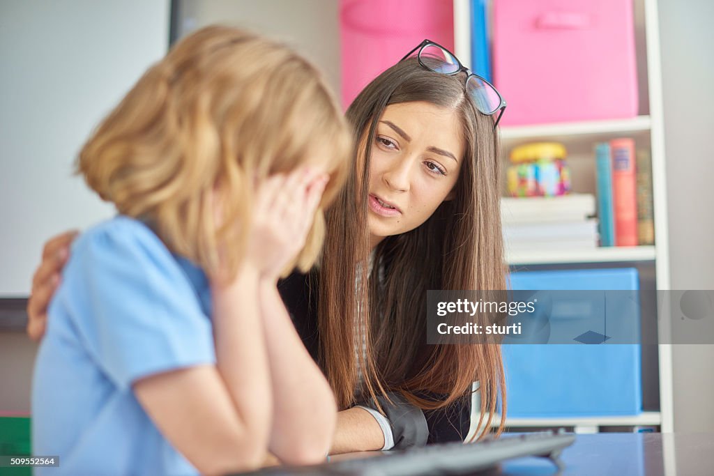 Crying schoolgirl