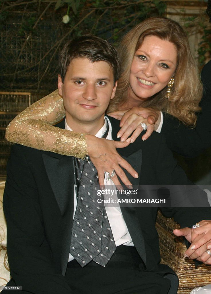 Georgina Risk Lebanese former Miss Universe Georgina Rizk poses with her son Ali ...