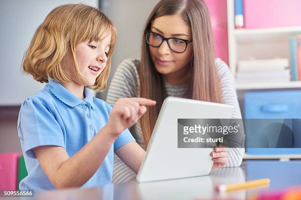good teachers know when to listen - elementary school building stock pictures, royalty-free photos & images