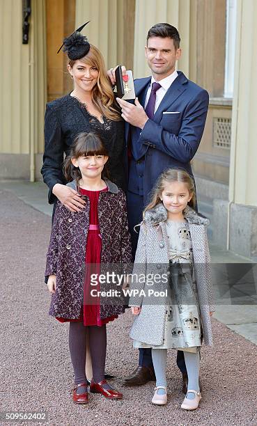 Bowler James Anderson at Buckingham Palace, London, with wife Daniella and daughters Lola and Ruby , after he was made an OBE by the Prince of Wales...