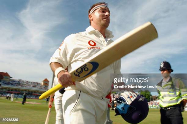 Graham Thorpe of England leaves the field, after his century during the fourth day of the third npower Test Match between England and New Zealand at...