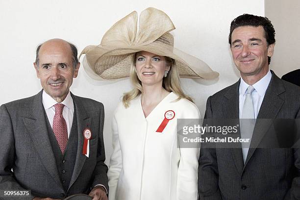 Mr Jean-Louis Dumas President of Hermes, stands with Edouard of Rothschild, President of France Galop and Rothschild's wife at the Prix de Diane...