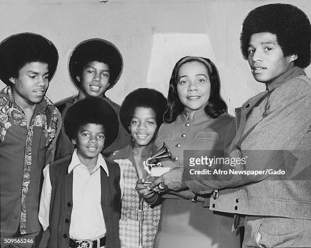 Jackie Jackson presents a GRAMMY to Mrs Coretta King, for the album titled Why I am Opposed to the War in Vietnam, from left Michael, Tito, Jermaine,...