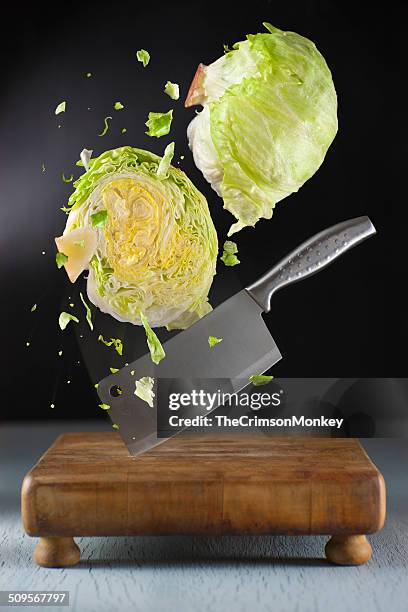 chopping lettuce - meat cleaver stock pictures, royalty-free photos & images