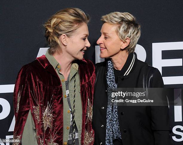 Actress Portia de Rossi and Ellen DeGeneres attend the Saint Laurent show at The Hollywood Palladium on February 10, 2016 in Los Angeles, California.