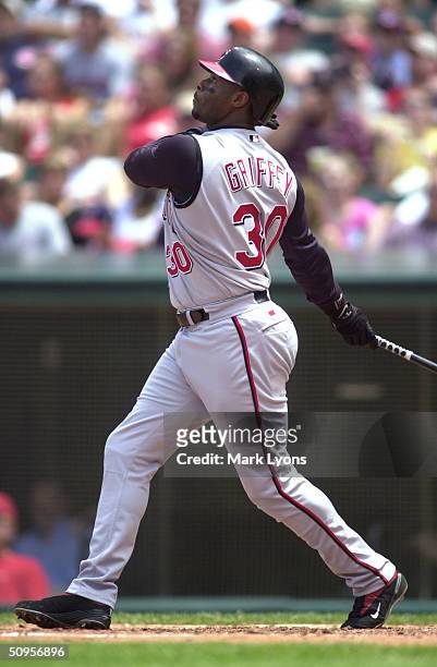 Ken Griffey Jr. #30 of the Cincinnati Reds watches his 499th career home run in the third inning against the Cleveland Indians June 13, 2004 at...