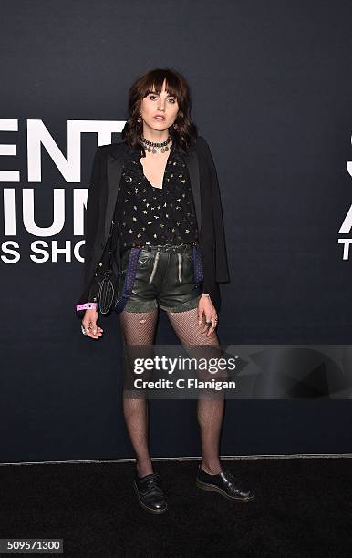 Artist Langley Fox, in Saint Laurent by Hedi Slimane, arrives at the Saint Laurent show at the Hollywood Palladium on February 10, 2016 in Los...