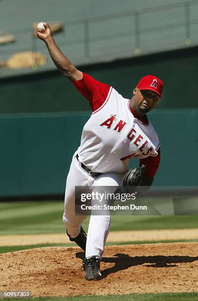 Pitcher Kelvim Escobar of the Anaheim Angels pitches to the Chicago Cubs on June 13, 2004 at Angel Stadium in Anaheim, California.