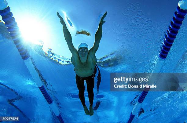 Jayme Cramer swims in the Men's 100M Butterfly Final at the Janet Evans Invitational on June 13, 2004 in Long Beach, California.