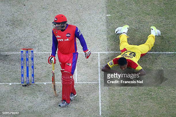 Krishmar Santokie of Sagittarius reacts after failing to run out Virender Sehwag of Gemini Arabians during the Oxigen Masters Champions League Semi...
