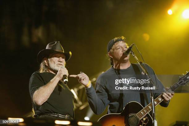 Willie Nelson performs with Pat Green at the 2004 CMA Music Festival June 13, 2004 in Nashville, Tenessee. The four-day festival, the largest in...