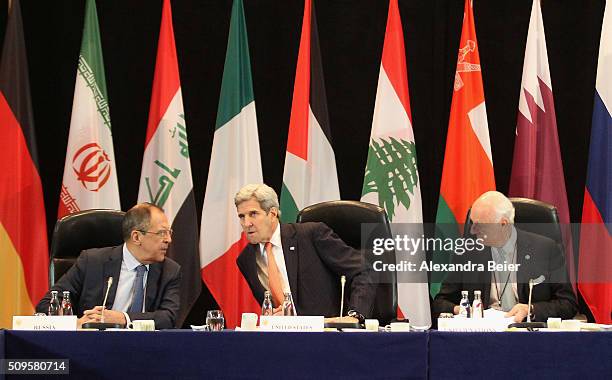 Russian foreign minister Sergey Lavrov, U.S. Secretary of State John Kerry and UN special envoy on Syria Staffan de Mistura are pictured during a...