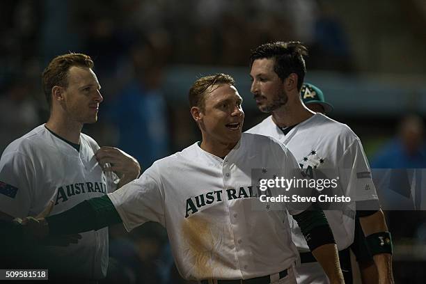 Luke Hughes of Australia celebrates with teammate after defeating Team Philippines in Game 2 of the World Baseball Classic Qualifier at Blacktown...