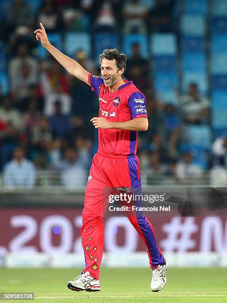 Graham Onions of Gemini celebrates the wicket of Adam Gilchrist of Sagittarius during the Oxigen Masters Champions League Semi Final match between...