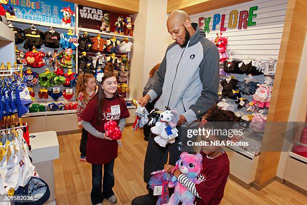 Adreian Payne of the Minnesota Timberwolves in partnership with HopeKids assist children with life-threatening illnesses create stuffed animals and...