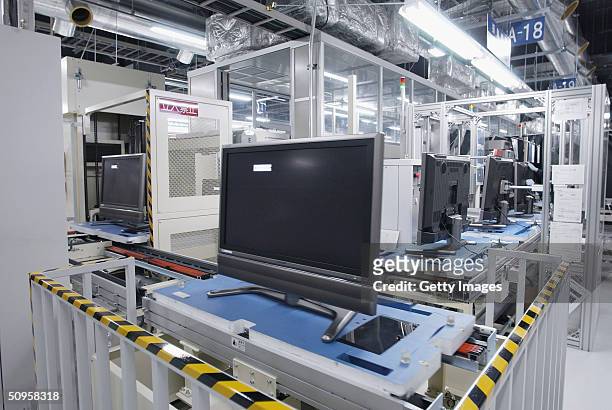 In this undated handout photo from Sharp, lines of LCD TVs are seen at the Kameyama factory of Japan's electronics company. Sharp announced the new...