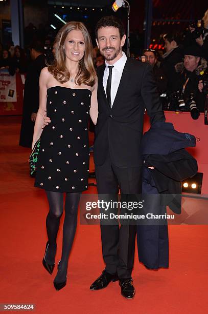 Katja Kraus and Oliver Berben attend the 'Hail, Caesar!' premiere during the 66th Berlinale International Film Festival Berlin at Berlinale Palace on...