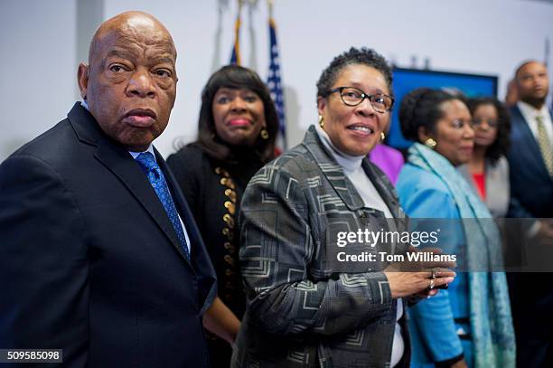 From left, Reps. John Lewis, D-Ga., Terri Sewell, D-Ala., and Marcia Fudge, D-Ohio, attend a news conference at the DNC where members of the...