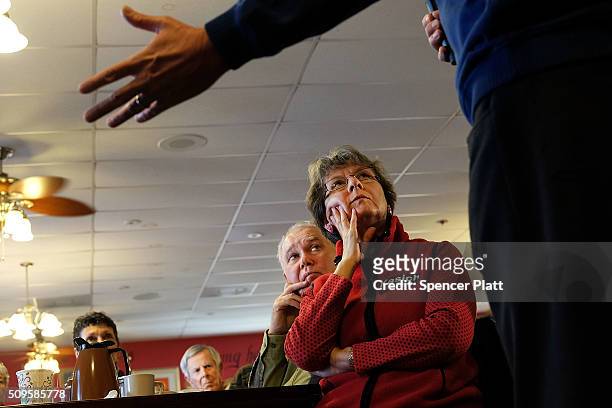 Ohio Governor and Republican presidential candidate John Kasich speaks to voters inside of a restaurant in South Carolina following his second place...