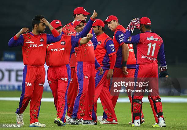 Gemini Arabians players celebrate a wicket during the Oxigen Masters Champions League Semi Final match between Gemini Arabians and Sagittarius...