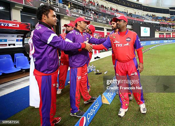 Muttiah Muralitharan of Gemini Arabians celebrates victory with his team-mates after the Oxigen Masters Champions League Semi Final match between...