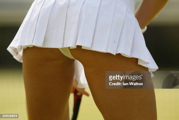 Nell McAndrew wears a short skirt during an LTA Photocall and Kids Coaching Clinic with Tim Henman at Wimbledon Park on June 14, 2004 in London.