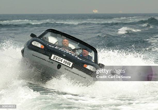 Virgin entrepreneur Richard Branson pilots his Gibbs Aquada amphibious car during a record-breaking crossing of the English Channel June 14, 2004...