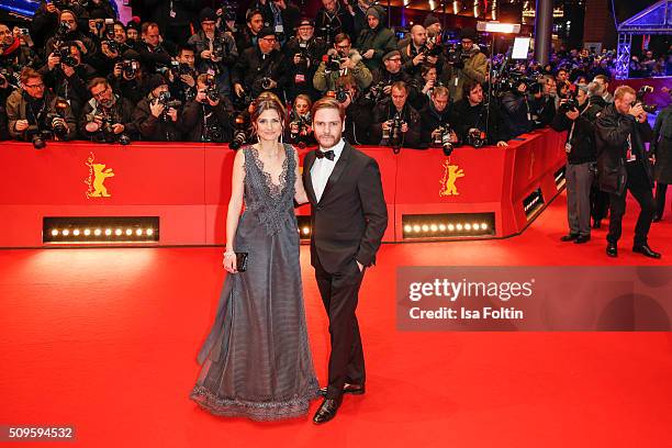 Felicitas Rombold and Daniel Bruehl attend the 'Hail, Caesar!' Premiere during the 66th Berlinale International Film Festival on February 11, 2016 in...