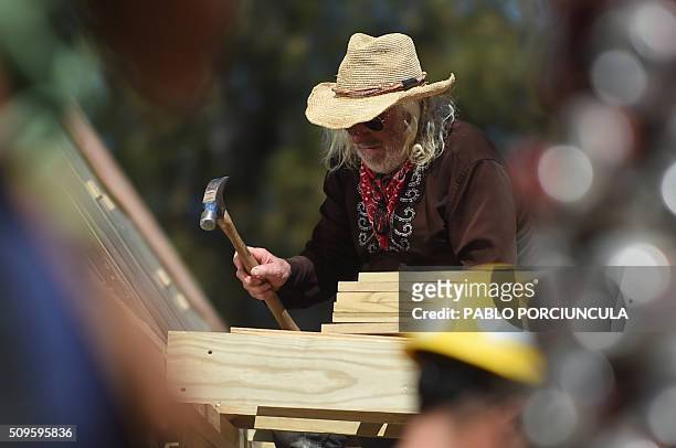 Architect Michael Reynolds works during the construction of an auto-sustainable elementary school in Jaureguiberry -80 km east of Montevideo,...