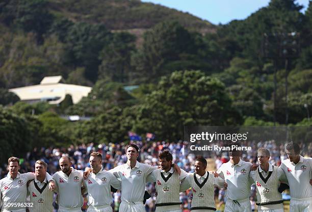 Australia sing their national anthem during day one of the Test match between New Zealand and Australia at Basin Reserve on February 12, 2016 in...