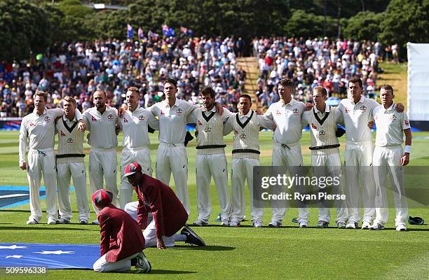 Australia sing their national anthem during day one of the Test match between New Zealand and Australia at Basin Reserve on February 12, 2016 in...