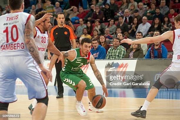 Mike James, #3 of the Laboral Kutxa Vitoria Gasteiz handles the ball against Elias Harris, #20 of the Brose Basktes Bamberg during the Turkish...