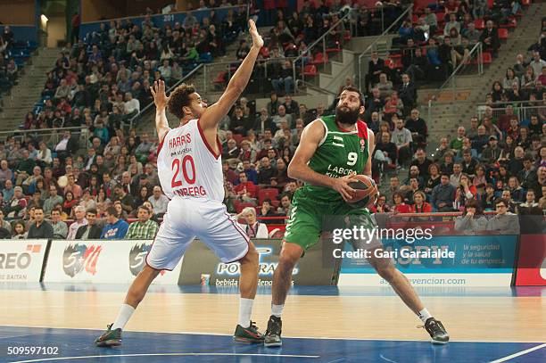 Ioannis Bourousis, #9 of the Laboral Kutxa Vitoria Gasteiz handles the ball against Elias Harris, #20 of the Brose Basktes Bamberg during the Turkish...