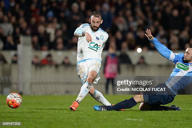 Marseille's Scottish forward Steven Fletcher shoots the balL during the French Cup football match Trelissac vs Marseille on February 11, 2016 at the...