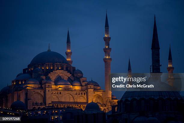 Suleymaniye Mosque is seen at sunset on February 11, 2016 in Istanbul, Turkey. Istanbul is famous for its skyline dotted with historic mosques, it is...