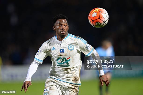 Marseille's French midfielder Georges-Kevin Nkoudou eyes the ball during the French Cup football match Trelissac vs Marseille on February 11, 2016 at...