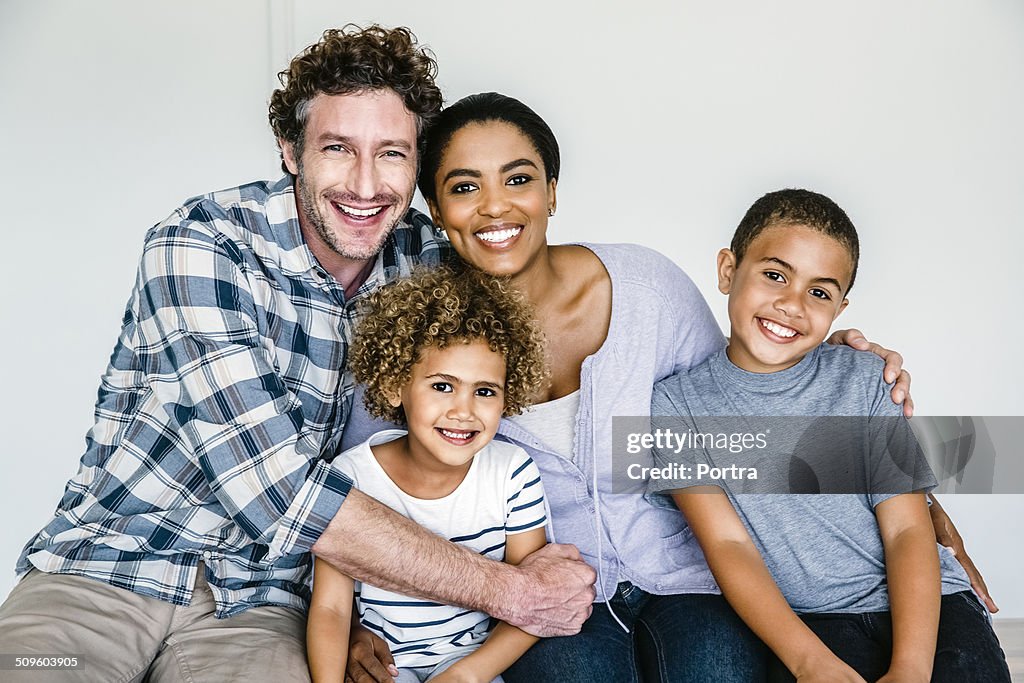 Happy multi-ethnic family at home